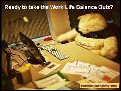 Teddy Bear taking work life balance quiz on computer