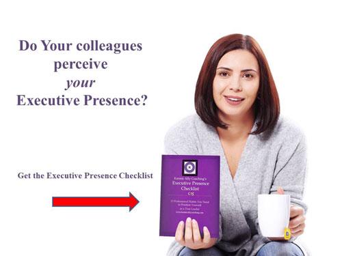 Woman holding Executive Presence Checklist and mug of coffee