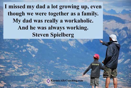 Father and young son looking at the mountain range with Steven Spielberg quote on Workaholicism 