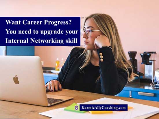 Professional Woman in front of laptop looking at advice to do internal networking for career progress