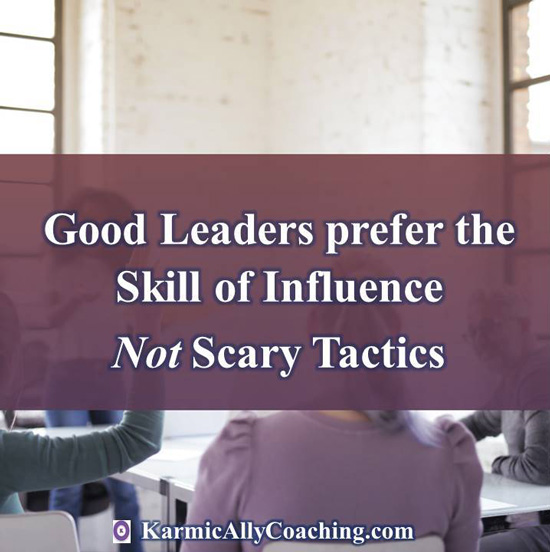 Leader in meeting with team using influence