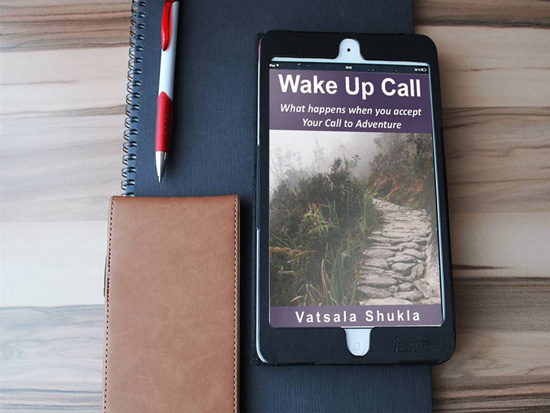 Wake Up Call Kindle ebook by Vatsala Shukla with backdrop of folder, diary and pen